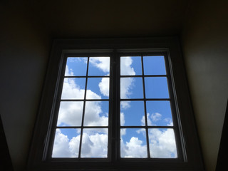 Window with blue skies