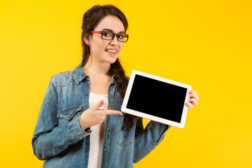 Young woman with tablet computer