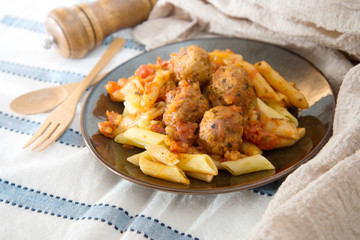 tasty penne with Meat ball and tomato sauce