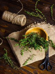 brunch of thyme on a linnen centrepiece