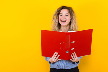 Woman in shirt with big folder