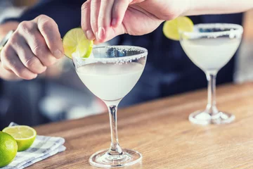 Foto auf Acrylglas Margarita. Margatita alcoholic cocktail drink on barcounter in pub or restaurant © weyo