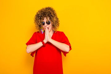 Attractive woman with short curly hair