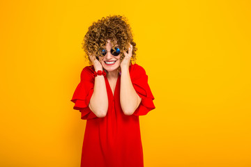 Attractive woman with short curly hair