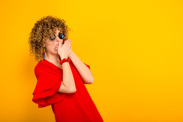 Attractive woman with short curly hair