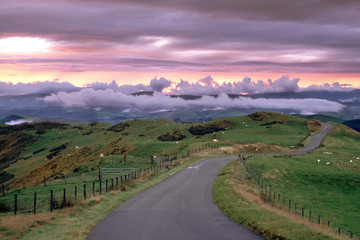 Wales, Powys, near Machynlleth, storm cloud sunset, winding road