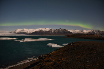 Fototapeta na wymiar Iceland Aurora Northern Lights and star from Jokulsarlon glacier lake アイスランド ヨークルスアゥルロゥン ヨークルサルロン オーロラ 星空