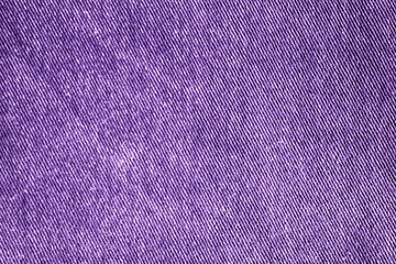 Purple Detailed closeup of blank grungy denim. Vintage dark gray jeans, good for background.