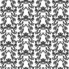 Seamless pattern with ornate Decorative flowers on a white background.  Ideal for textile print and wallpapers.