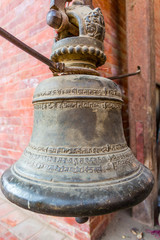 Fototapeta premium Bell Hanging from a Beam