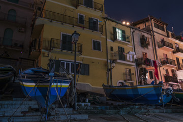 Fototapeta na wymiar Il pittoresco villaggio di pescatori di Chianalea di notte, provincia di Reggio Calabria IT 