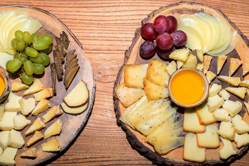 Cheese slices and pieces on plate