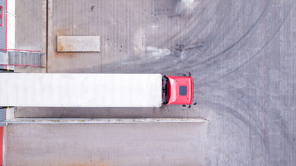 Aerial View of Loading Warehouse with Semi Truck. Aerial