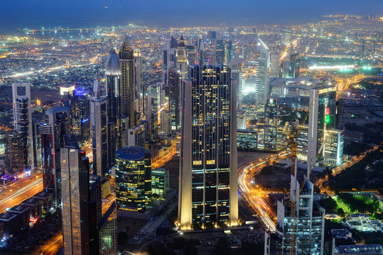 Aerial night view of skyscrapers of Dubai World Trade center