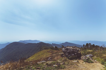 big rock on peak mountain natural landscape with blue sky on the vacation day.