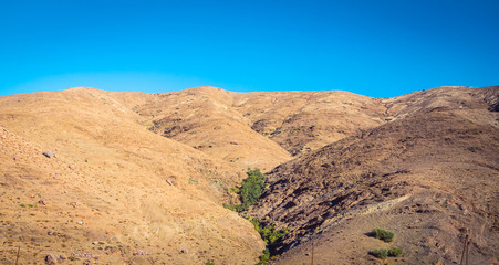 Desert road with Atlas Mountains, Morocco