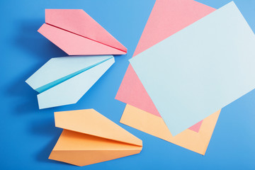 paper plane on blue color background