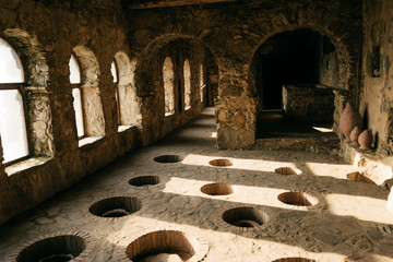 ancient stone room for wine making, alcohol industry