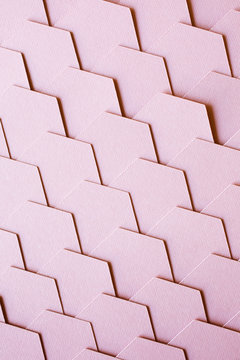 Close up of a a soft pink hexagon tiled background