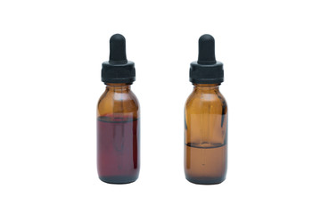 Universal indicator and Phenolphthalein solutions, the pH indicator in the brown glass bottle with dropper  isolated on white background with clipping path