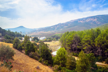 Fototapeta na wymiar Desert road with Atlas Mountains, Morocco
