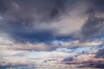 Obraz premium Blue sky with gray clouds