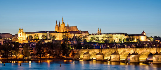 Panorama of Prague castle and Charles bridge by night, Czech republic