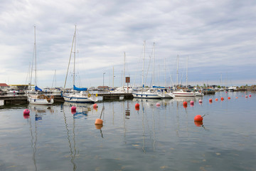 Naklejka premium Cloudy day in the Hanko port. Finland