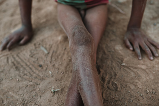 Crop legs of ethnic child