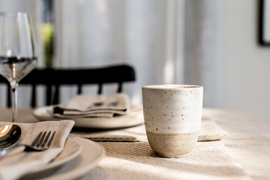 white ceramic uop on dining table