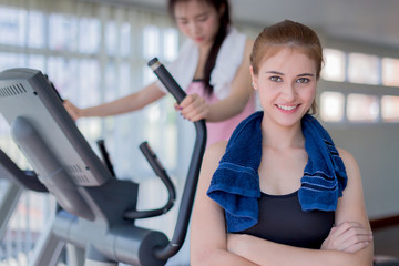 Fototapeta premium portrait of smart sport girl in sportwear in fitness center health concept