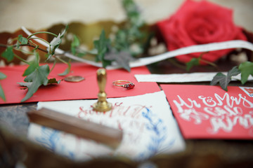 Naklejka na ściany i meble Wedding details calligraphy with flower on wood background
