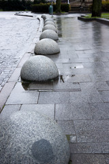 Street of granite stones in the old town, and hemisphere