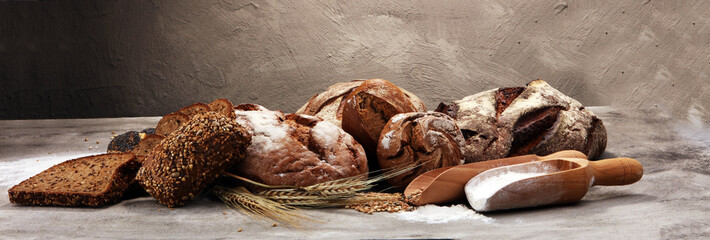 Different kinds of bread and bread rolls. Kitchen or bakery poster