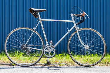 Vintage racing bicycle from the 60s with chrome steel frame - obrazy, fototapety, plakaty