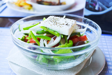 Greek salad with fresh vegetables. Traditional Greek food