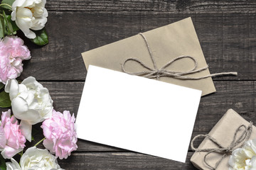 Stylish branding mockup to display your artworks. vintage wedding greeting card with pink and white roses and gift box
