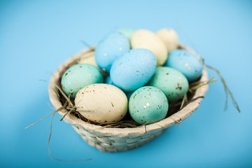 Naklejka na ściany i meble Easter eggs on blue background