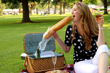 Attractive Woman Sitting at a Picnic