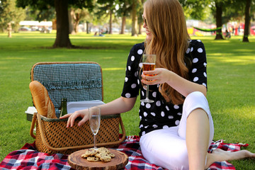 Attractive Woman Sitting at a Picnic