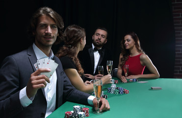 group of sinister poker players