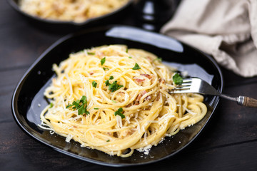 Spaghetti carbonara with egg and pancetta