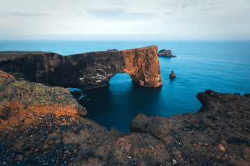 Fototapeta premium Unique basalt arch on Dyrholaey cape. Nature Reserve, Iceland. Landscape photography