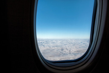 Fototapeta na wymiar blue sky outside airplane window