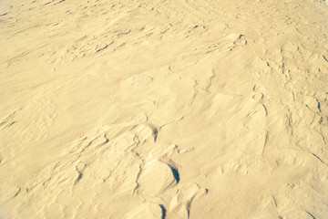 Texture of golden sand, abstract background