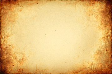 Old brown paper texture with vignette.