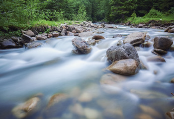River deep in mountain forest.