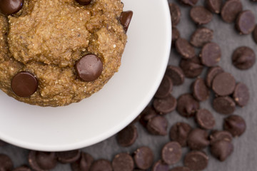 Homemade Chocolate Chip Muffins on a Slate Tabletop