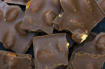 Background of chocolate. Chocolate with hazelnut.