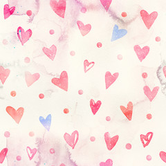 Seamless watercolor pattern with colorful hearts - romantic light and soft tints of pink and red.